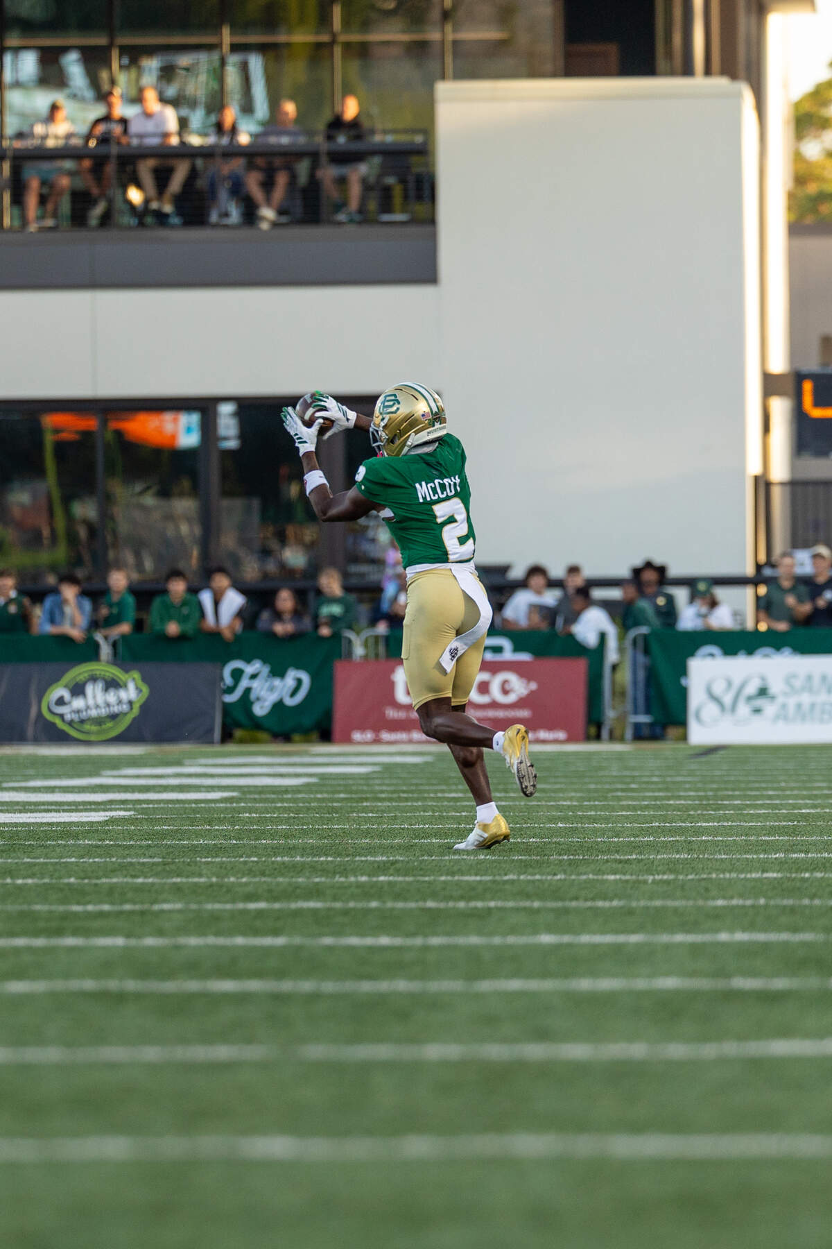 Cal Poly wide receiver Tayvion McCoy catches a pass from quarterback Anthony Grigsby Jr. at Mustang Memorial Field on Sept. 19, 2026. The Mustangs lost to the Toreros 38-35 on Homecoming night on a last-minute field goal.